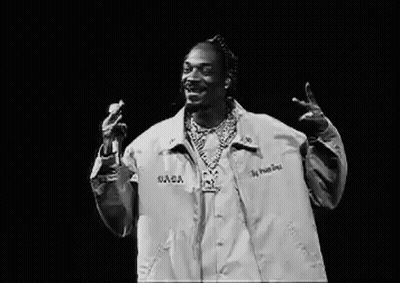 Black And White Snoop Dogg Singing Into Microphone GIF