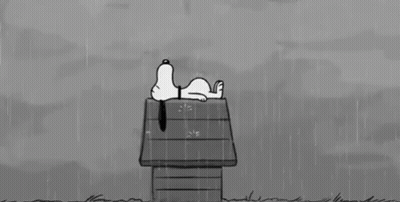 Black And White Snoopy Laying On Doghouse In Rain GIF