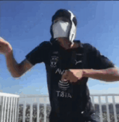 Black And White Soccer Player Kicking Ball GIF
