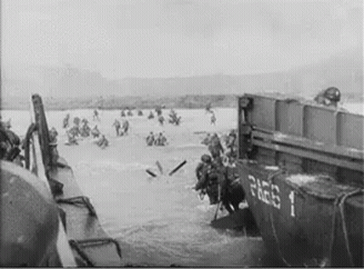 Black And White Soldiers Getting Off Boat GIF