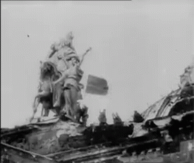 Black And White Statue On Building GIF