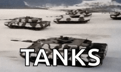 Black And White Tanks Driving Through Snow GIF
