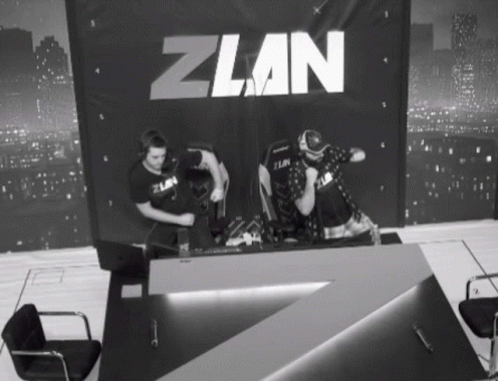 Black And White Two Men In Front Of Screen Zlan GIF