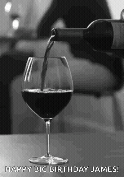 Black And White Wine Being Poured Into Glass GIF