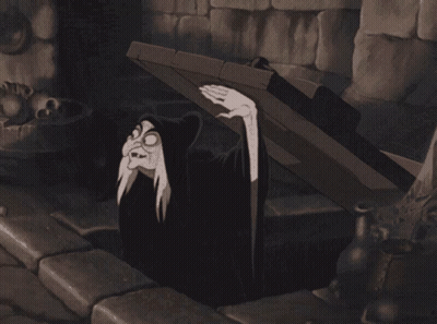 Black And White Witch Coming Out Of Hole GIF