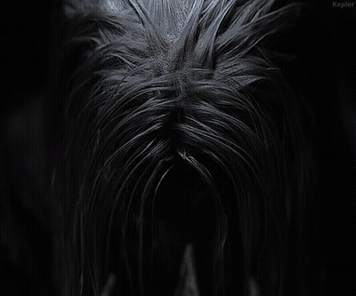 Black And White Witch With Long Hair GIF