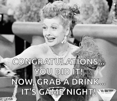 Black And White Woman At Table With Martini GIF