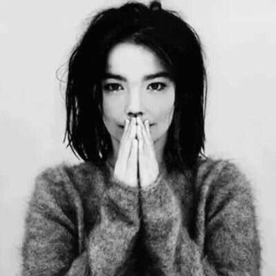 Black And White Woman Covering Mouth With Hands GIF