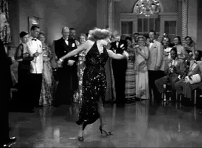Black And White Woman Dancing In Front Of Crowd GIF