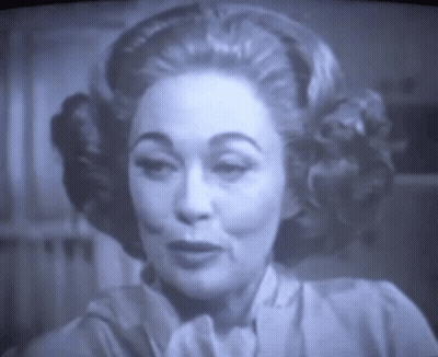 Black And White Woman Face On TV Screen GIF