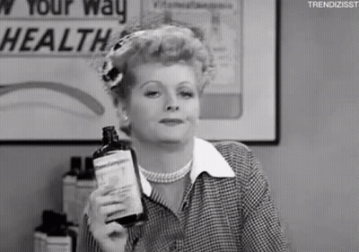 Black And White Woman Holding Bottle GIF