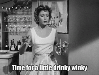 Black And White Woman Holding Glass Saying Time For A Little Drinky Winky GIF