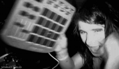 Black And White Woman Holding Remote GIF