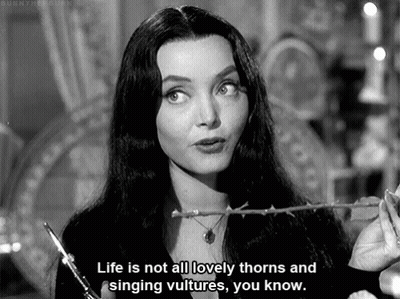 Black And White Woman Holding Rose Life Is Not All Lovely Thorns GIF