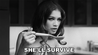 Black And White Woman Holding Spoon She'll Survive GIF