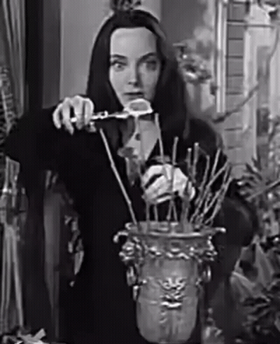 Black And White Woman Holding Vase GIF