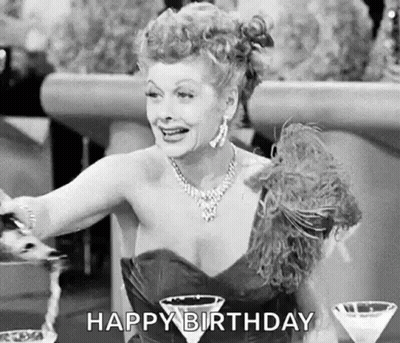 Black And White Woman In Dress With Martini Glasses Saying Happy Birthday GIF