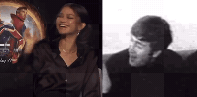 Black And White Woman Laughing Next To Man Laughing GIF