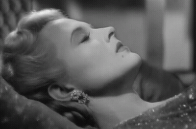 Black And White Woman Laying Down GIF