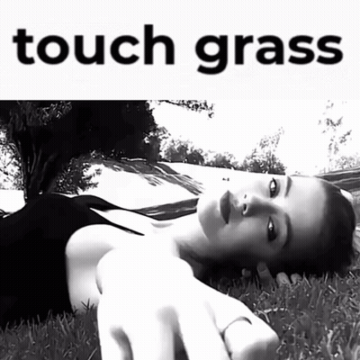 Black and White Woman Laying in Grass