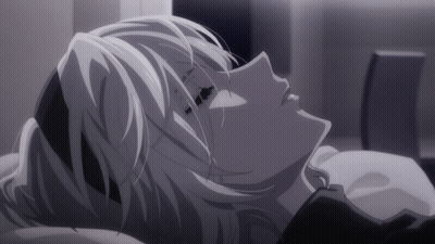 Black And White Woman Laying On Bed GIF