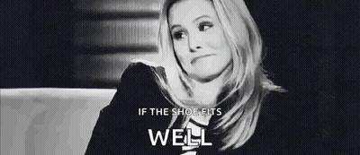 Black And White Woman Making Funny Face On Couch GIF