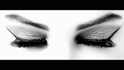 Black And White Woman's Eyes With Makeup GIF