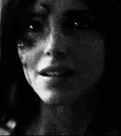 Black And White Woman's Face GIF