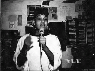 Black And White Woman Singing Into Microphone YL GIF