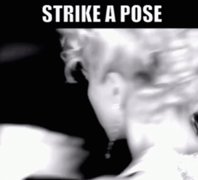 Black And White Woman Strike A Pose GIF