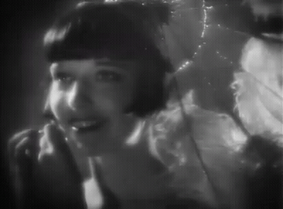 Black And White Woman Talking On Phone GIF
