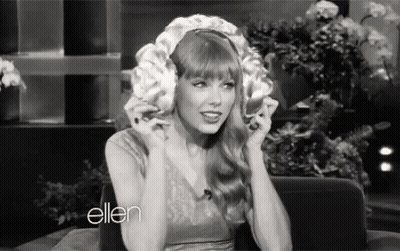 Black And White Woman Wearing Wig On Show GIF