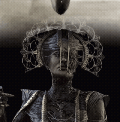 Black And White Woman With Crown And Necklaces GIF