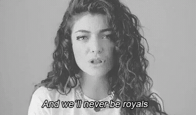 Black And White Woman With Curly Hair And We'll Never Be Royals GIF