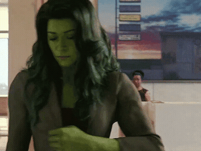 Black And White Woman With Green Face Paint GIF