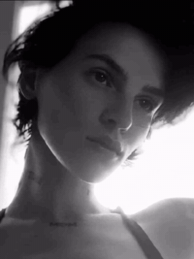 Black And White Woman With Neck Tattoo GIF