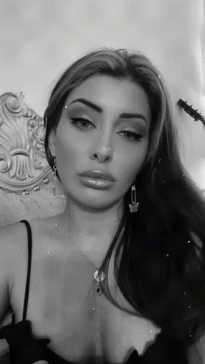 Black And White Woman With Necklace GIF