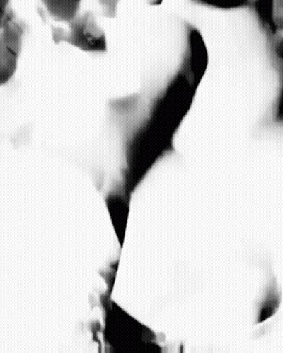 Black And White Woman With Smoke From Mouth GIF