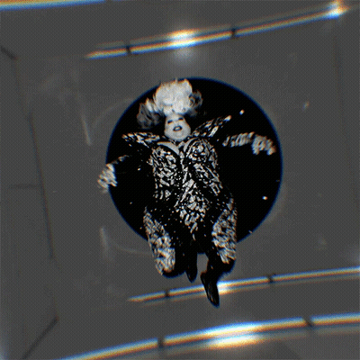Black And White Woman With Wig GIF