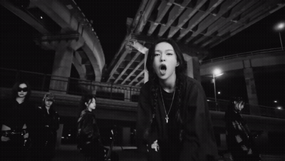 Black And White Women Near Bicycles And Building GIF