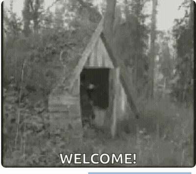 Black And White Wooden House In Woods Saying Welcome GIF