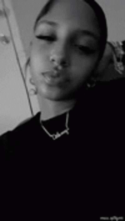 Black And White Young Woman With Necklace GIF