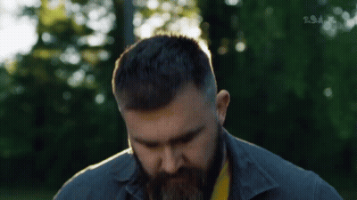 Black Angry Bird With Orange Beak And Red Eyebrows GIF