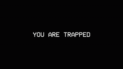 Black Background Saying You Are Trapped GIF