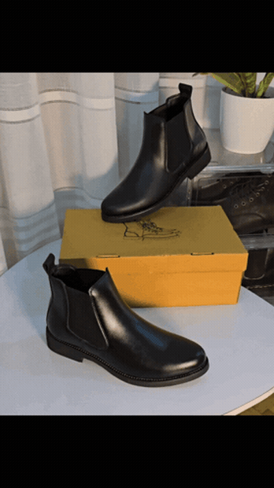 Black Boots Next To Yellow Box GIF