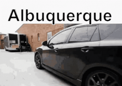 Black Car By Albuquerque Building GIF