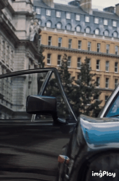 Black Car In Front Of Building With Imgplay GIF