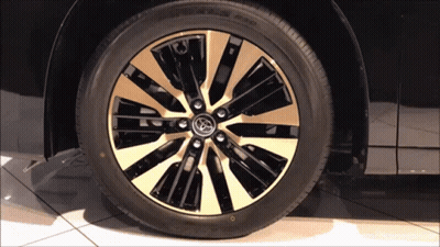 Black Car With Gold Rim And Toyota Logo GIF