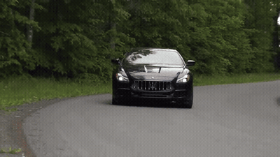 Black Car With Letter M Driving GIF