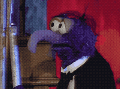 Black Car With License Plate KA-977-LO Driving Down Street GIF